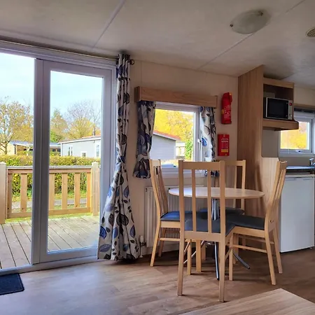 Strandhuis 'Het Kompas' Lauwersoog Exterior photo
